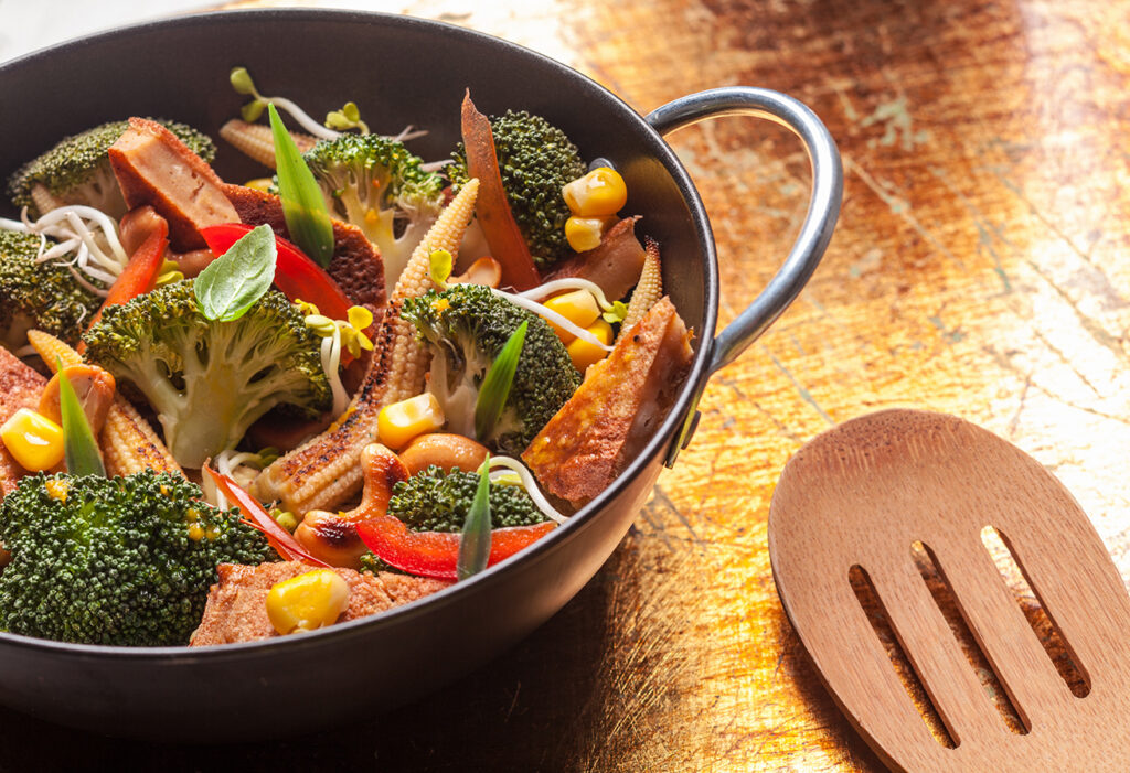 Fresh Asian roasted vegetables in a wok for a quick easy light healthy meal rich in vitamins