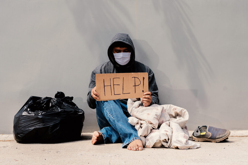 homeless man unemployed on the street due to corona virus covid 19 and need help